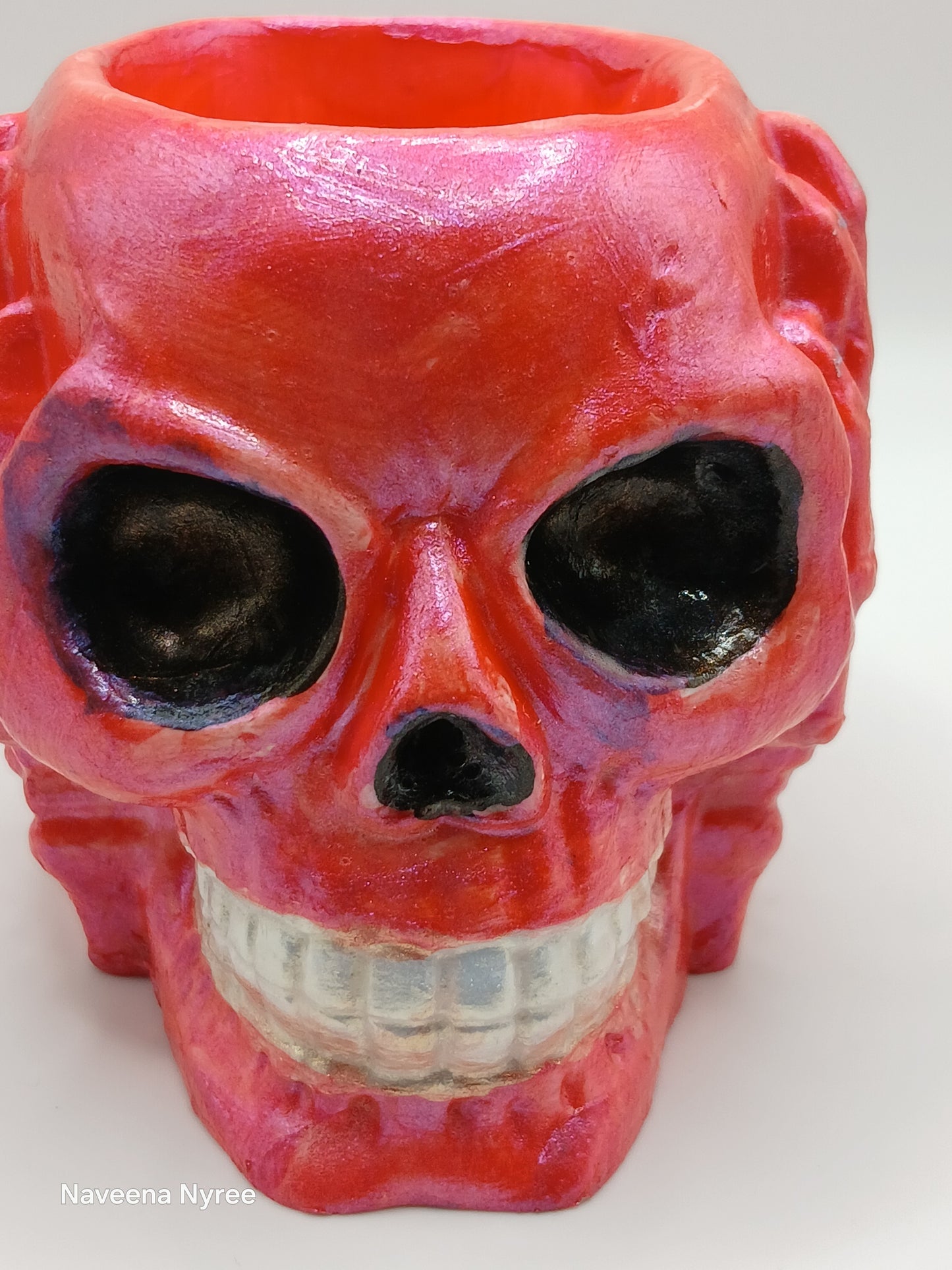 Oopsie hear, see, and speak no evil skulls.