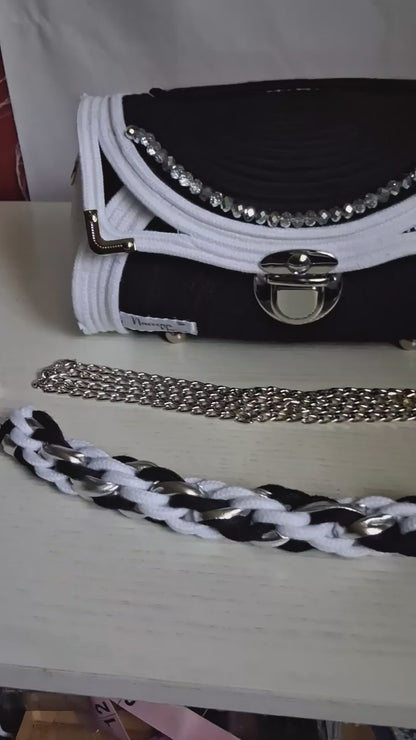 Black, white, and silver rope purse