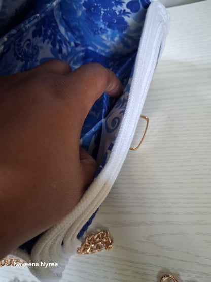 Royal blue and white rope/cord purse.