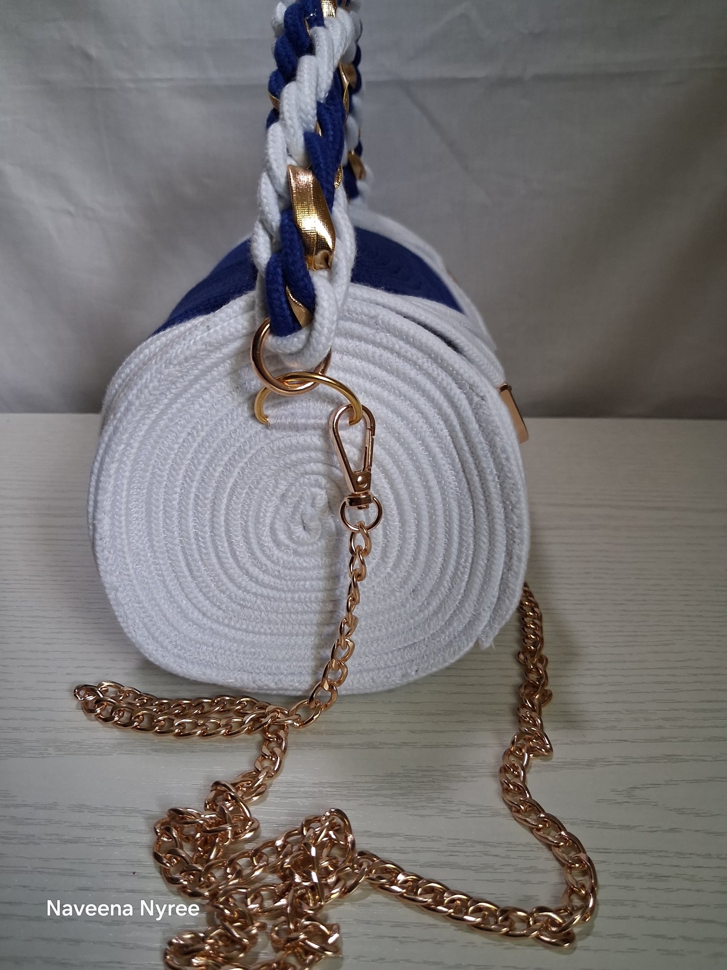 Royal blue and white rope/cord purse.