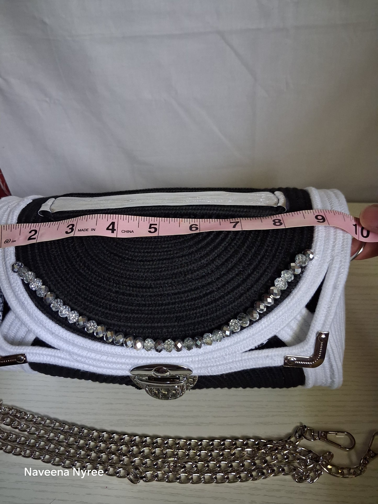 Black, white, and silver rope purse