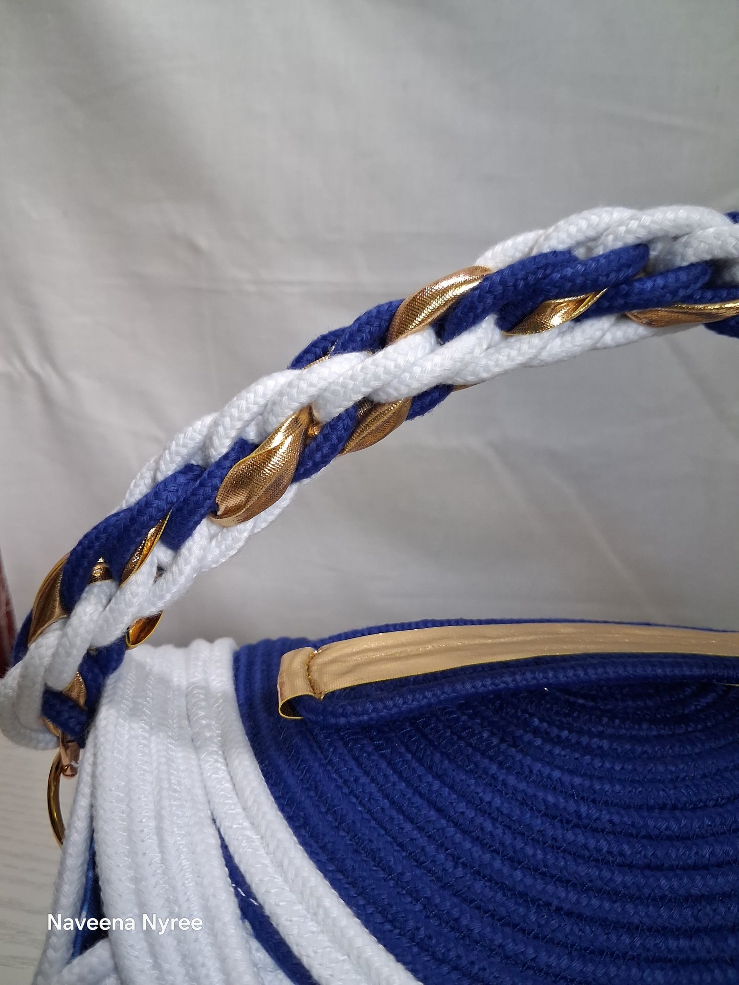 Royal blue and white rope/cord purse.