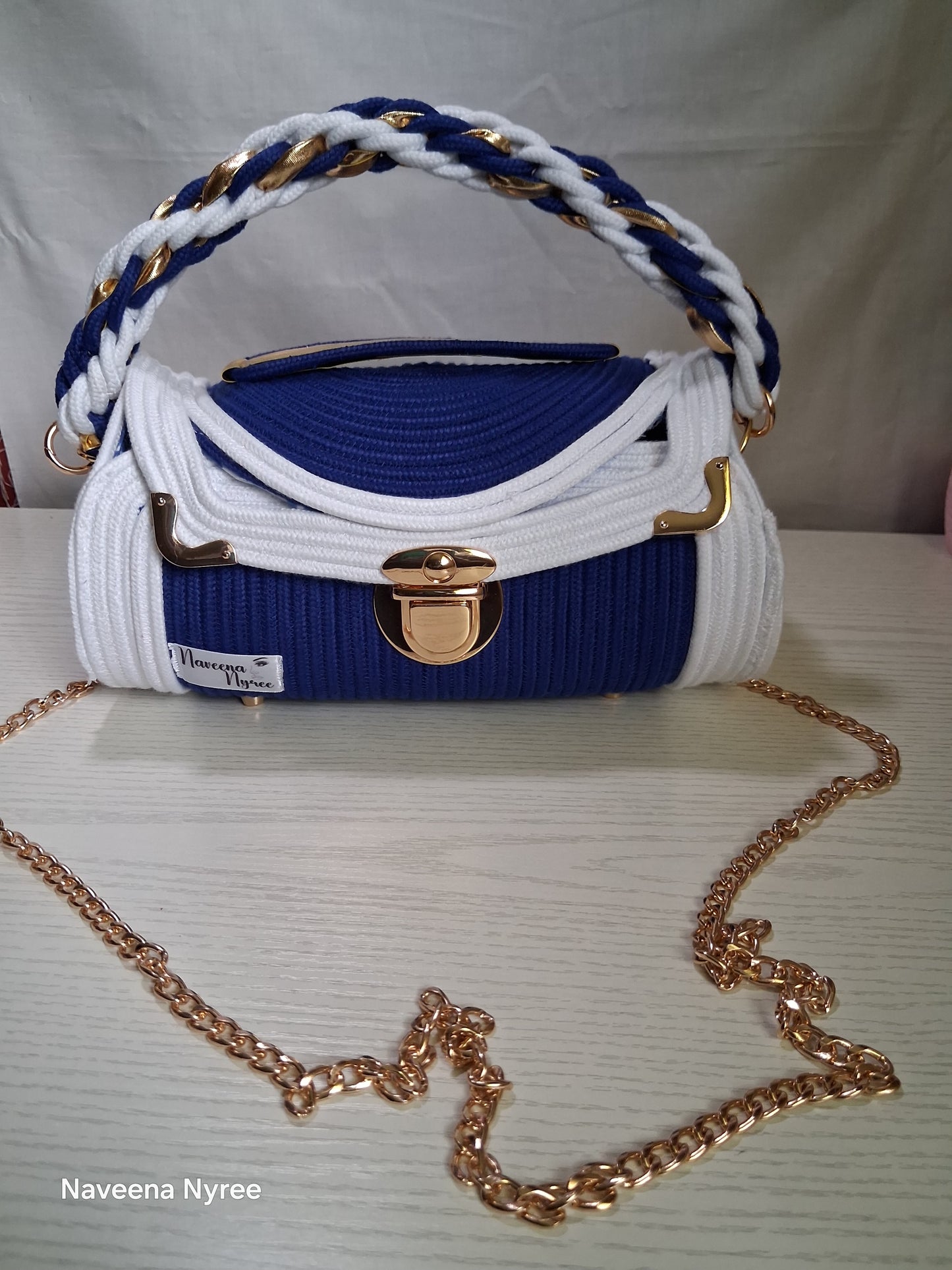 Royal blue and white rope/cord purse.