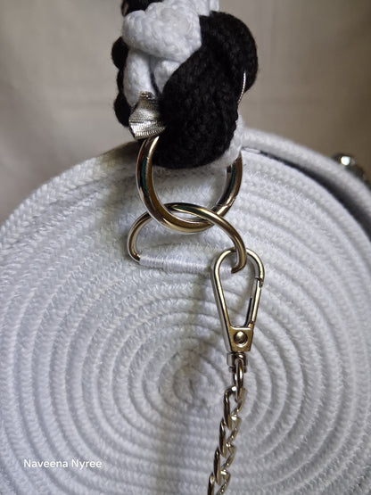 Black, white, and silver rope purse
